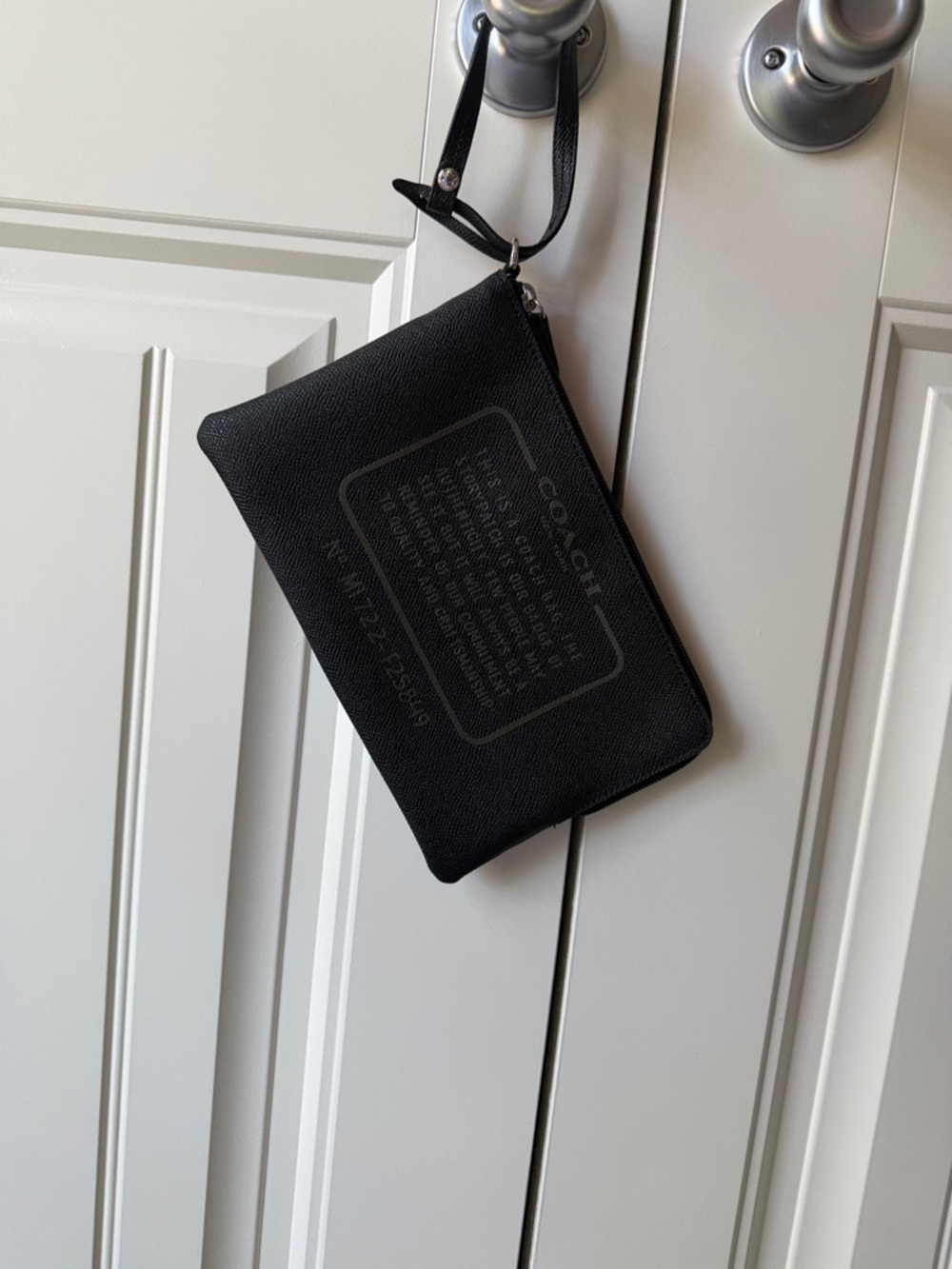 Coach Black Leather Zip Wristlet with Embossed Logo Panel
